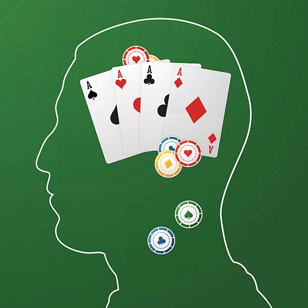 An outline of a head with poker chips and 4 aces